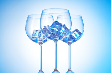 Glasses of water against gradient background