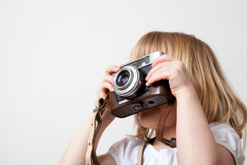 Little girl with camera