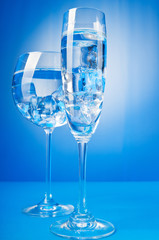 Water in the glass against gradient background