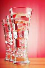 Water in the glass against gradient background