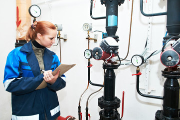 heating engineer in boiler room