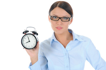 woman with an alarm clock in a hand.