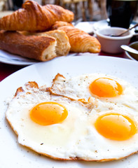 Breakfast with coffee and prepared egg