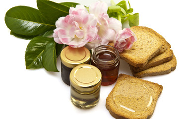 Obraz na płótnie Canvas Italian Honey of different qualities on white background