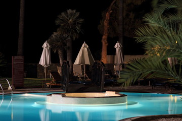 Swimming pool at night Resort hotel Spain
