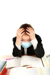 schoolboy in flu mask isolated on the white