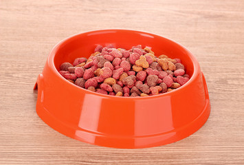 Cats food on wooden table