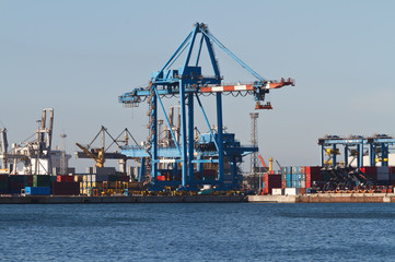 port with cranes and containers in Genoa, Italy