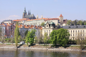 View on the spring Prague gothic Castle above River Vltava