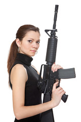 Beautiful girl holding a rifle