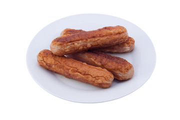 Fried sausages. Isolated, contains clipping path.