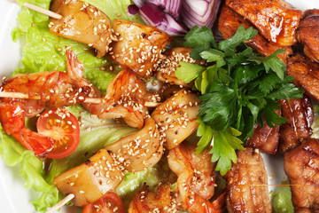 barbecue with sauce and vegetables