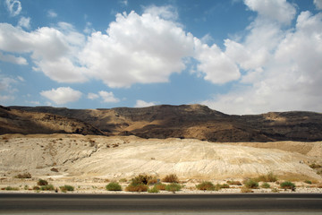 Stone desert and mountains along the road