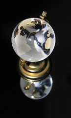 crystal globe on black background