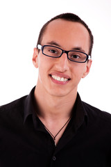 portrait of a young man smiling with glasses