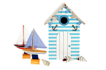 Beach hut with sailing boats