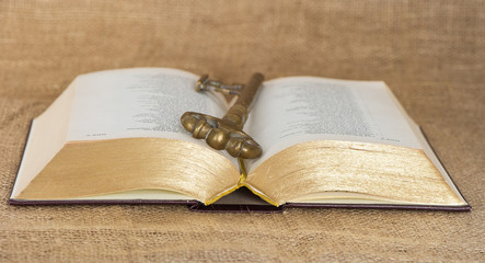 key and opened old bible