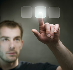 Young Man pushing the button