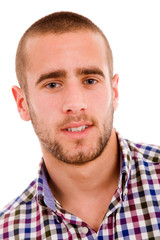 Obraz premium Close-up Portrait of a happy young man, isolated on white backgr