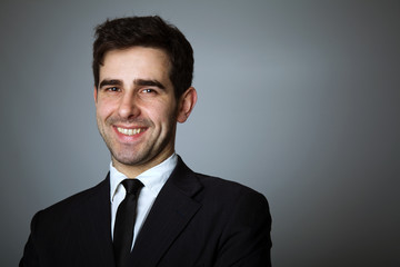 Close-up portrait of a handsome young business man