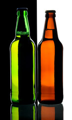 Bottles of beer from green and brown glass, isolated.
