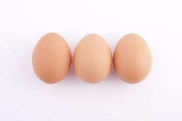 three eggs on the white