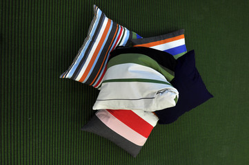 colorful pillow on the floor