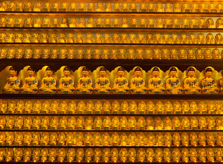Golden buddha statues at Yakcheonsa Temple, Jeju Island, South K