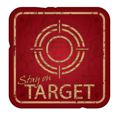 Old damaged stay on target sign, strategy concept