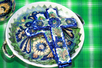 Ceramic handicrafts on green carpet