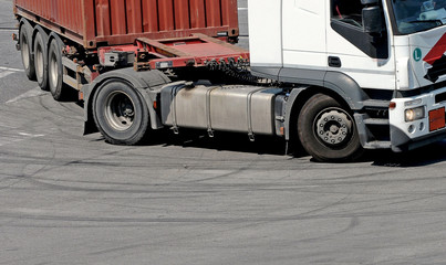 withe truck on the street