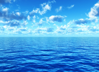 Fototapeta na wymiar cloudy blue sky leaving for horizon above blue surface of sea