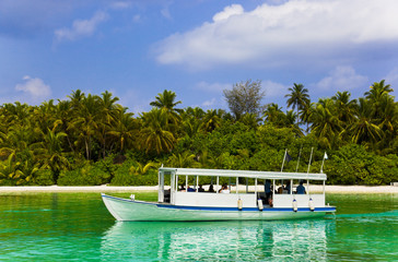 Tropical island and boat
