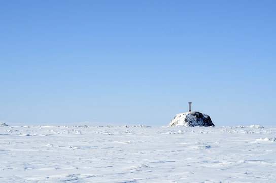 Arctic landscape with lighthouse