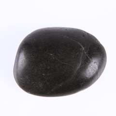 Spa stone on a white background