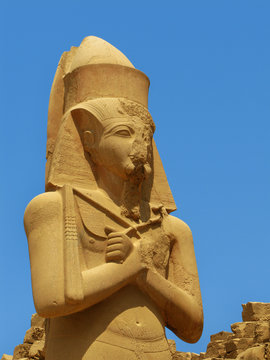 Luxor: giant statue of Ramses II, at Karnak Temple. Egypt