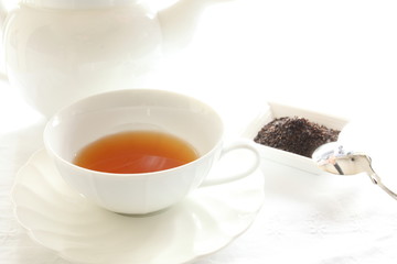 Obraz na płótnie Canvas English tea and tea leaves