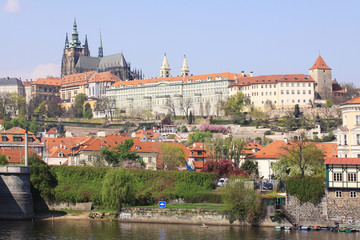 Fototapeta premium View on the spring Prague gothic Castle above River Vltava