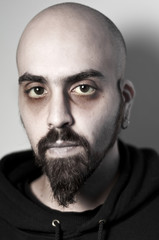 sick man with dark circles and toxic