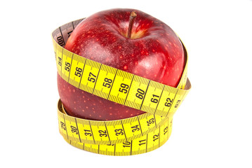 measuring tape around red apple isolated on white