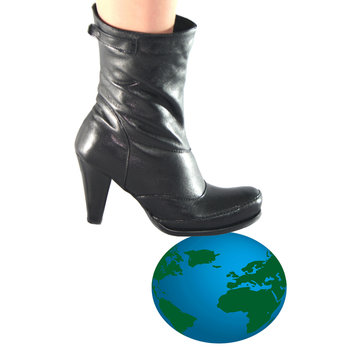 Globe under woman boot