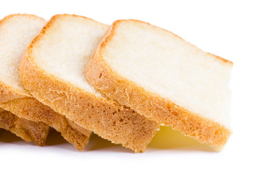 Fresh hot slices of home-made bread isolated on a white