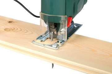 sawing wood board electric jigsaw