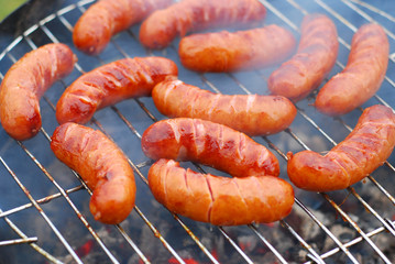 sausages on the grill