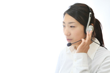 ヘッドセットをした女性