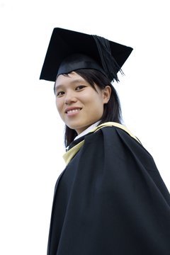 Smiling asian lady graduate portrait on white