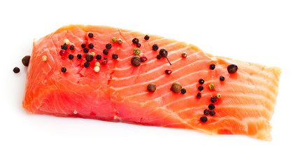 Red fish with pepper  isolated on white