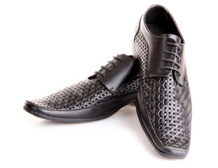 Black shiny man's shoe isolated on white