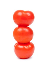 Some red tomatos in group isolated