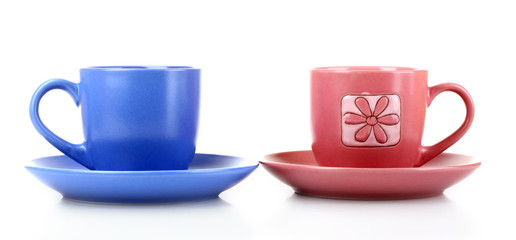 Set of colorful cups on white background